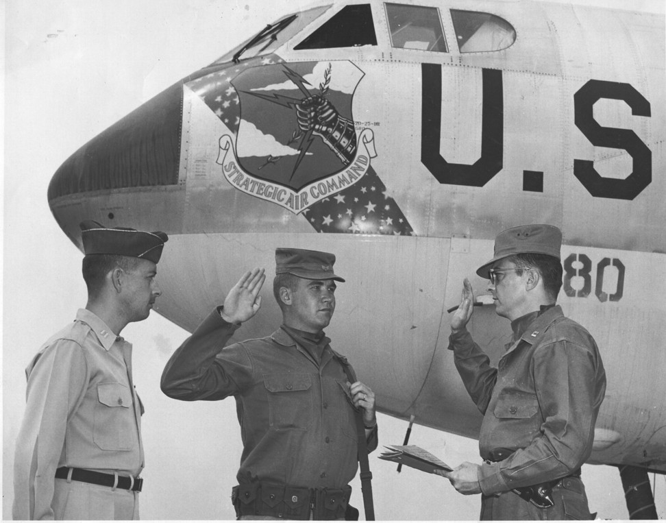 Ted Ellis Re-enlistment. Oath administered by Capt. William H. Wise Squadron Commander 25 July 1958.